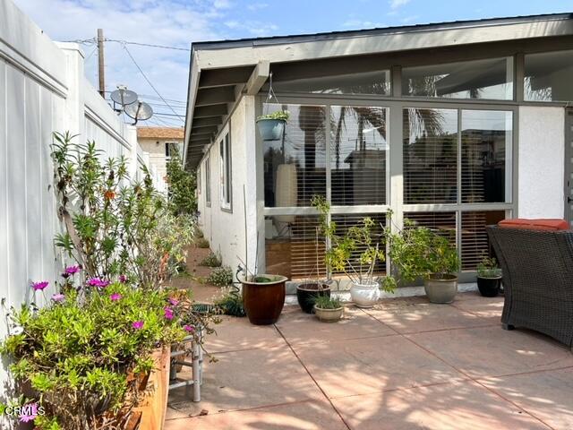213 Rossmore Drive Oxnard, CA 93035 - Photo 2 of 28 a front view of a house with a garden