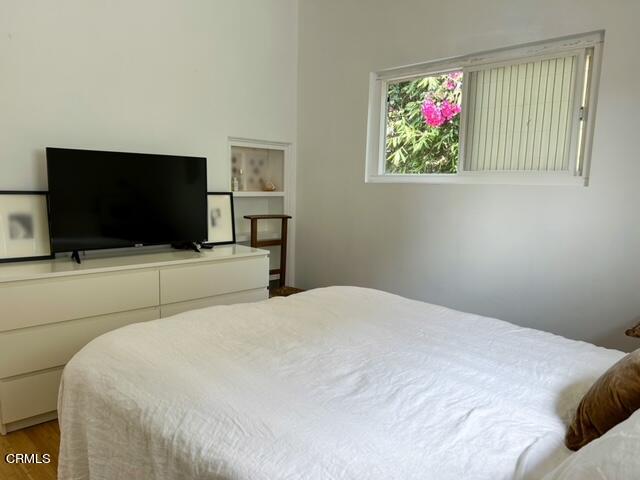 213 Rossmore Drive Oxnard, CA 93035 - Photo 26 of 28 a bedroom with a bed and a flat screen tv