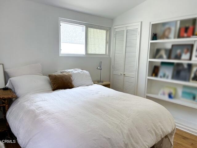 213 Rossmore Drive Oxnard, CA 93035 - Photo 27 of 28 a bedroom with a bed and closet
