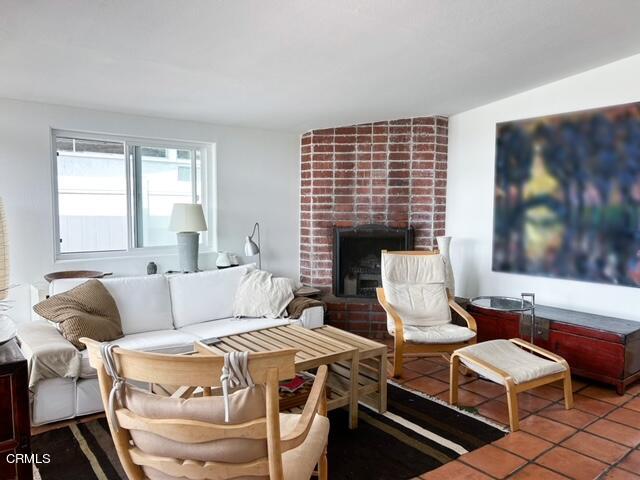 213 Rossmore Drive Oxnard, CA 93035 - Photo 7 of 28 a bedroom with furniture and a flat screen tv