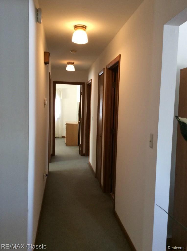 17305 Elwell Road Belleville, MI 48111 - Photo 16 of 30 From Dining Room the Hallway to Bedrooms