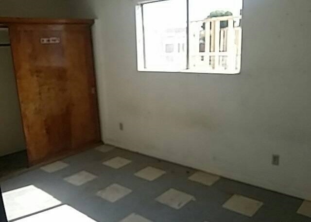 830 East Duff Avenue Reedley, CA 93654 - Photo 3 of 7 an empty room with a window