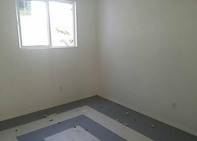 830 East Duff Avenue Reedley, CA 93654 - Photo 4 of 7 an empty room with a window