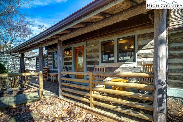 a bedroom with furniture and a fireplace