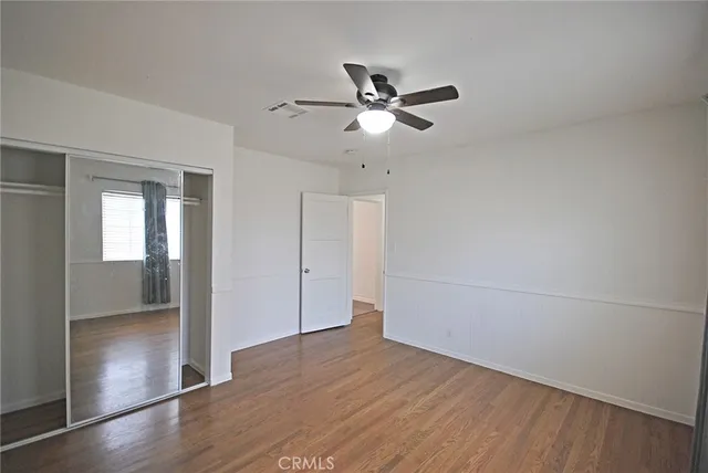 a bathroom with a double vanity sink and mirror