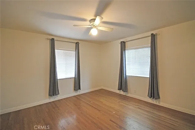 a view of a room with walk in closet and closet