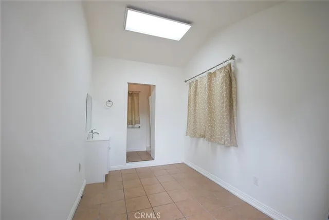 a view of a street sign of a house