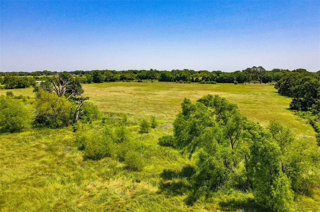 Tbd Tbd Fm-148 Scurry, TX 75158 - Photo 21 of 23 a view of a lake with houses in the background