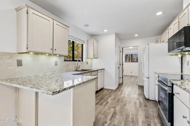 a view of kitchen and living room