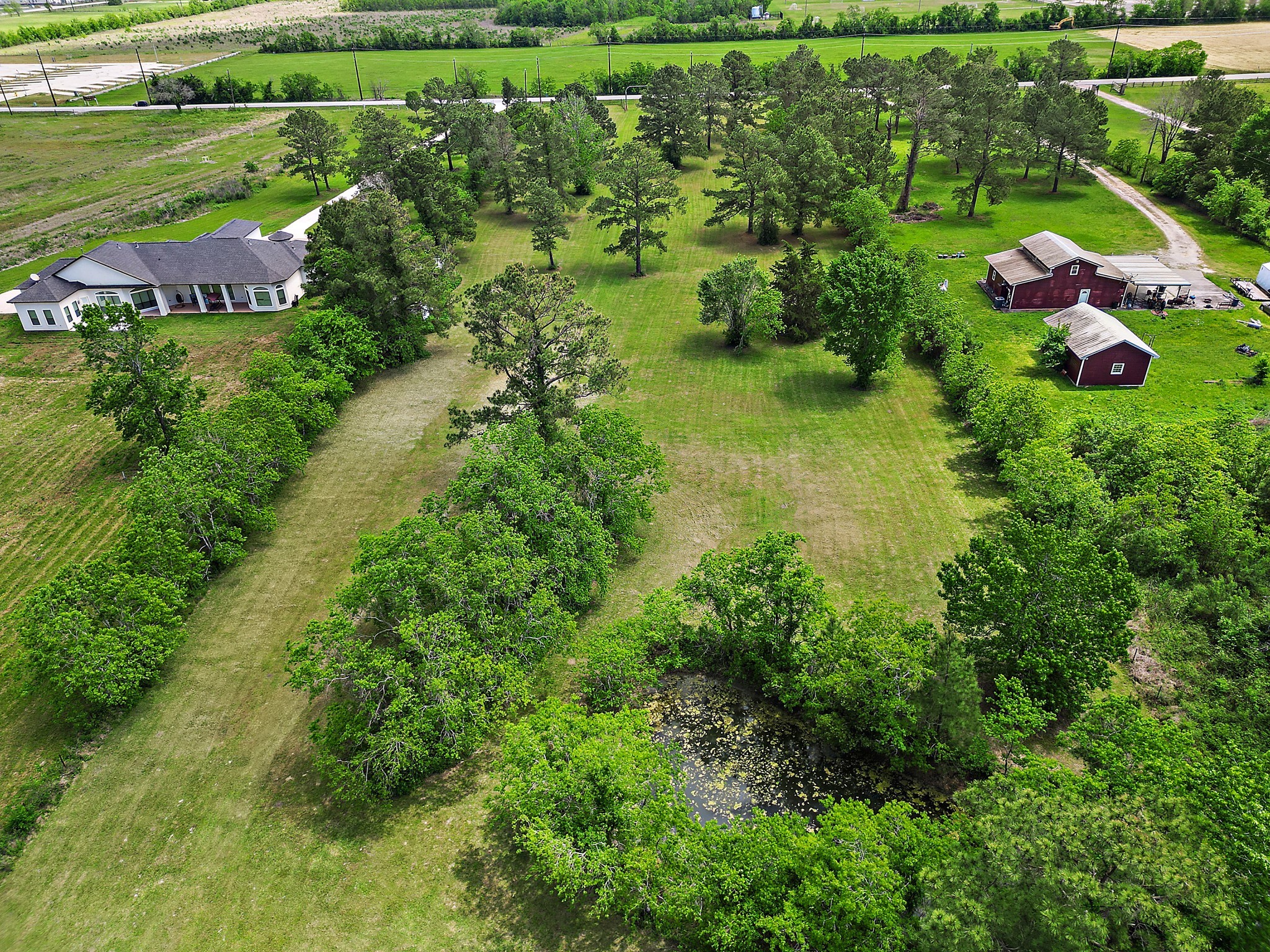 9915 North Main Street Baytown, TX 77521 - Photo 11 of 17 an aerial view of residential houses with outdoor space and street view