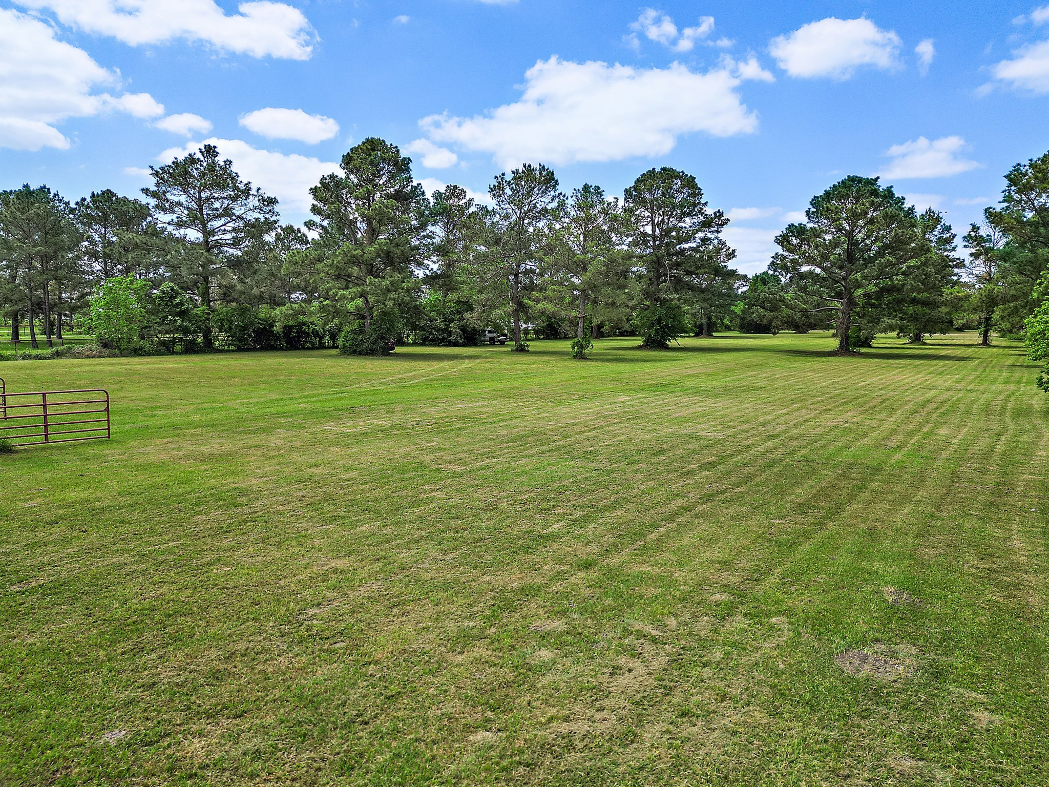 9915 North Main Street Baytown, TX 77521 - Photo 13 of 17 a view of a field with an trees