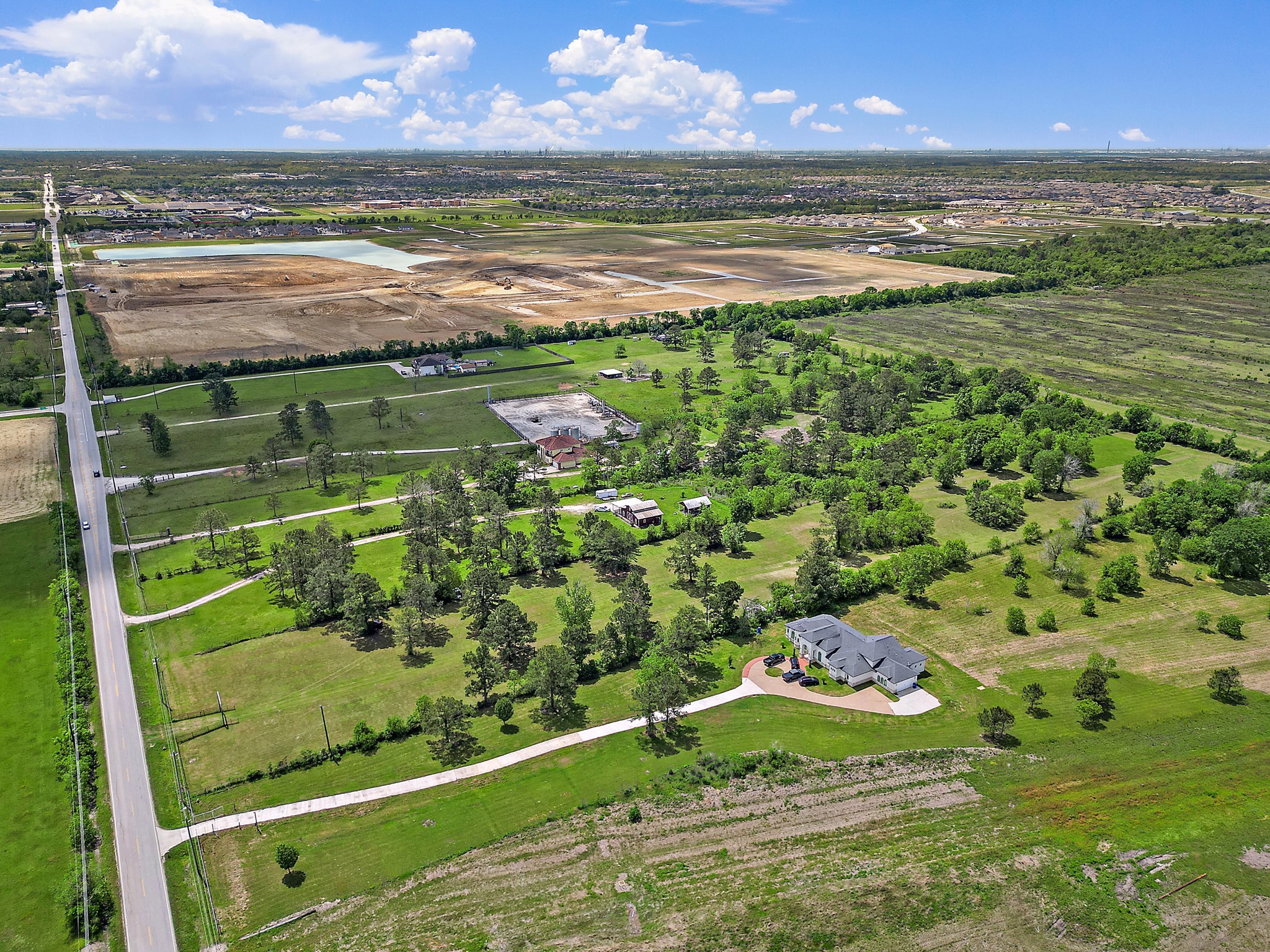 9915 North Main Street Baytown, TX 77521 - Photo 16 of 17 a view of a lake from a yard