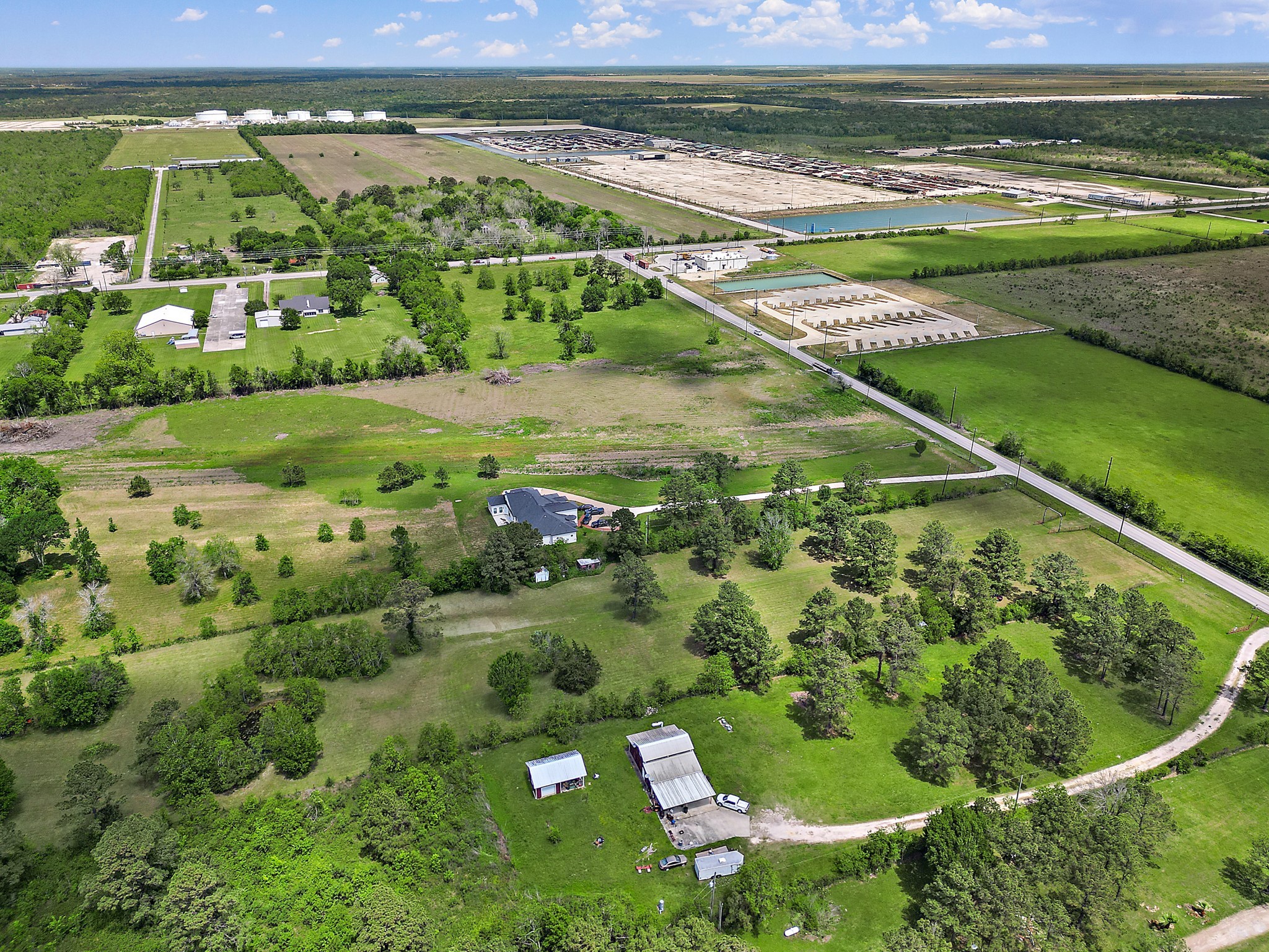 9915 North Main Street Baytown, TX 77521 - Photo 17 of 17 a view of a lush green field