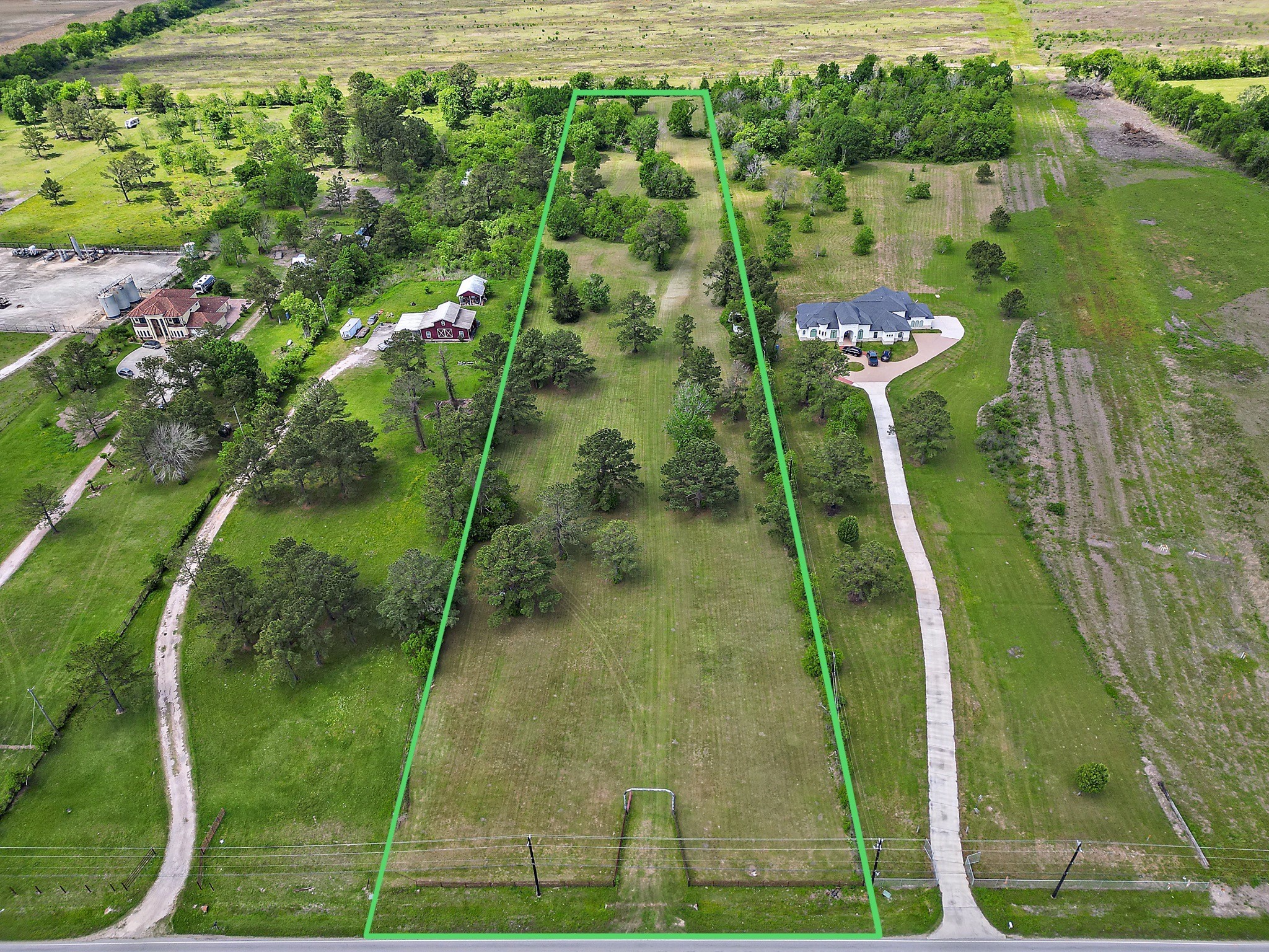 9915 North Main Street Baytown, TX 77521 - Photo 2 of 17 a view of a yard