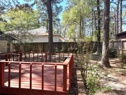 a view of patio with a table and chairs