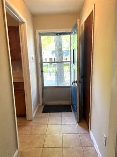 a view of entryway with a door