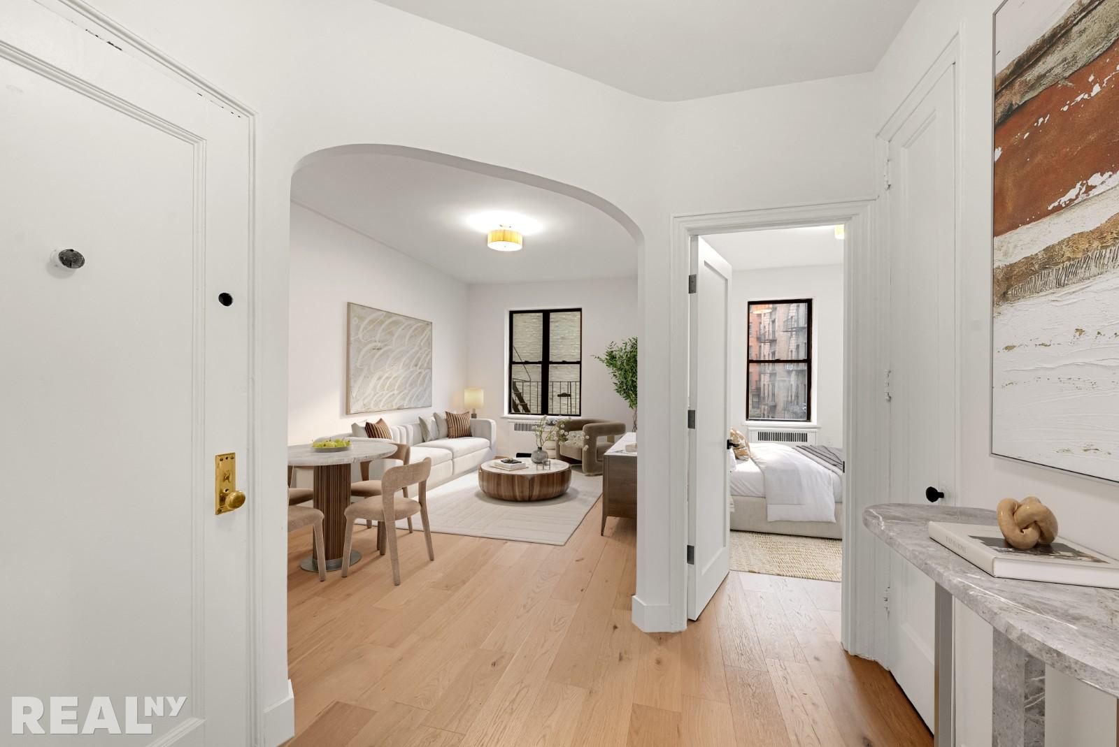 668 Riverside Drive, Unit 4G Manhattan, NY 11360 - Photo 2 of 11 a view of a living room and dining room