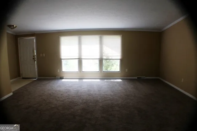 an empty room with a window