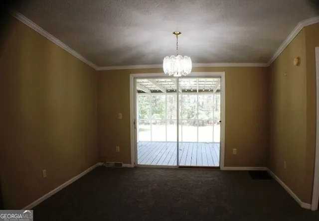 a view of a livingroom with a window