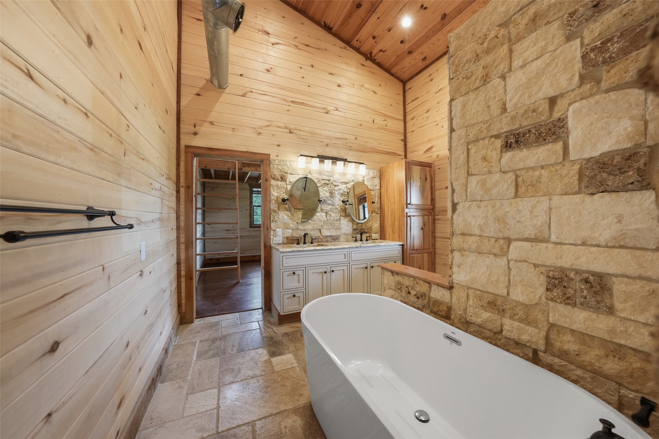 26534 Mitchell Road Hempstead, TX 77445 - Photo 24 of 45 a bathroom with a bathtub and a sink