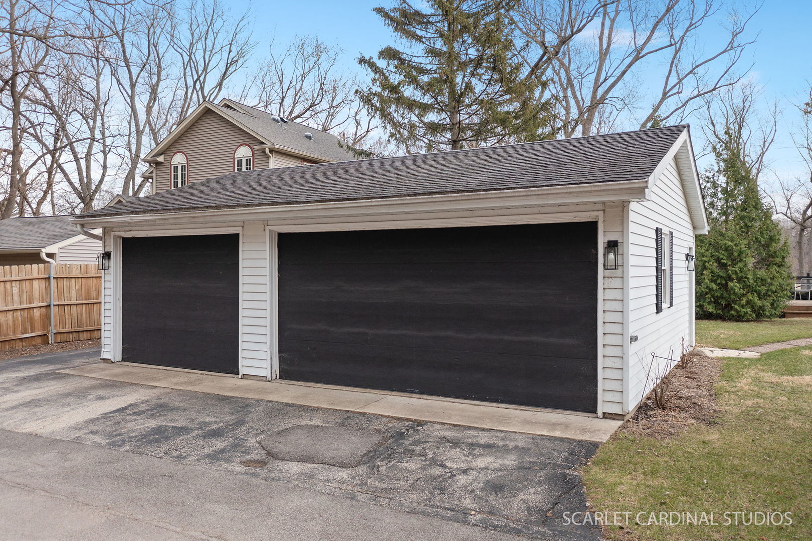 705 Spring Beach Way Cary, IL 60013 - Photo 20 of 32 a front view of a house with a yard and garage