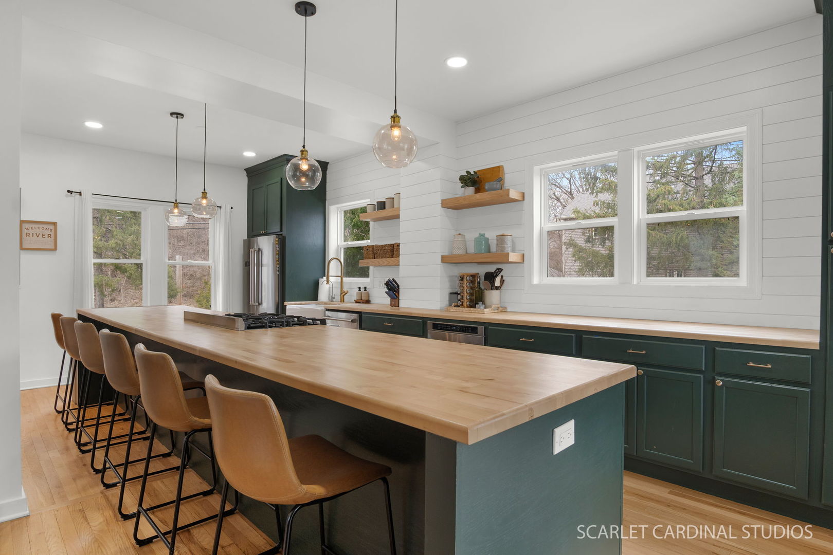 705 Spring Beach Way Cary, IL 60013 - Photo 4 of 32 a kitchen with center island table and chairs
