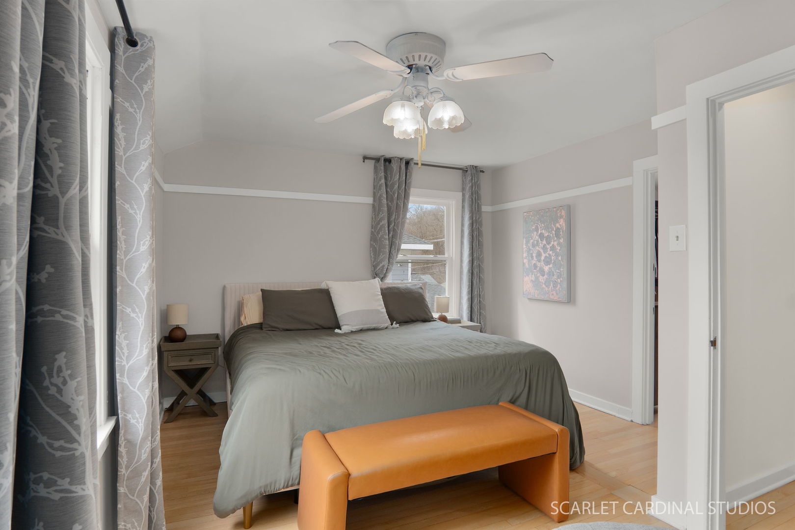 705 Spring Beach Way Cary, IL 60013 - Photo 8 of 32 a bedroom with a bed and a chandelier