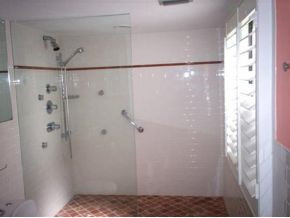 990 8th Street South, Unit 1 Naples, FL 34102 - Photo 7 of 10 a bathroom with a shower