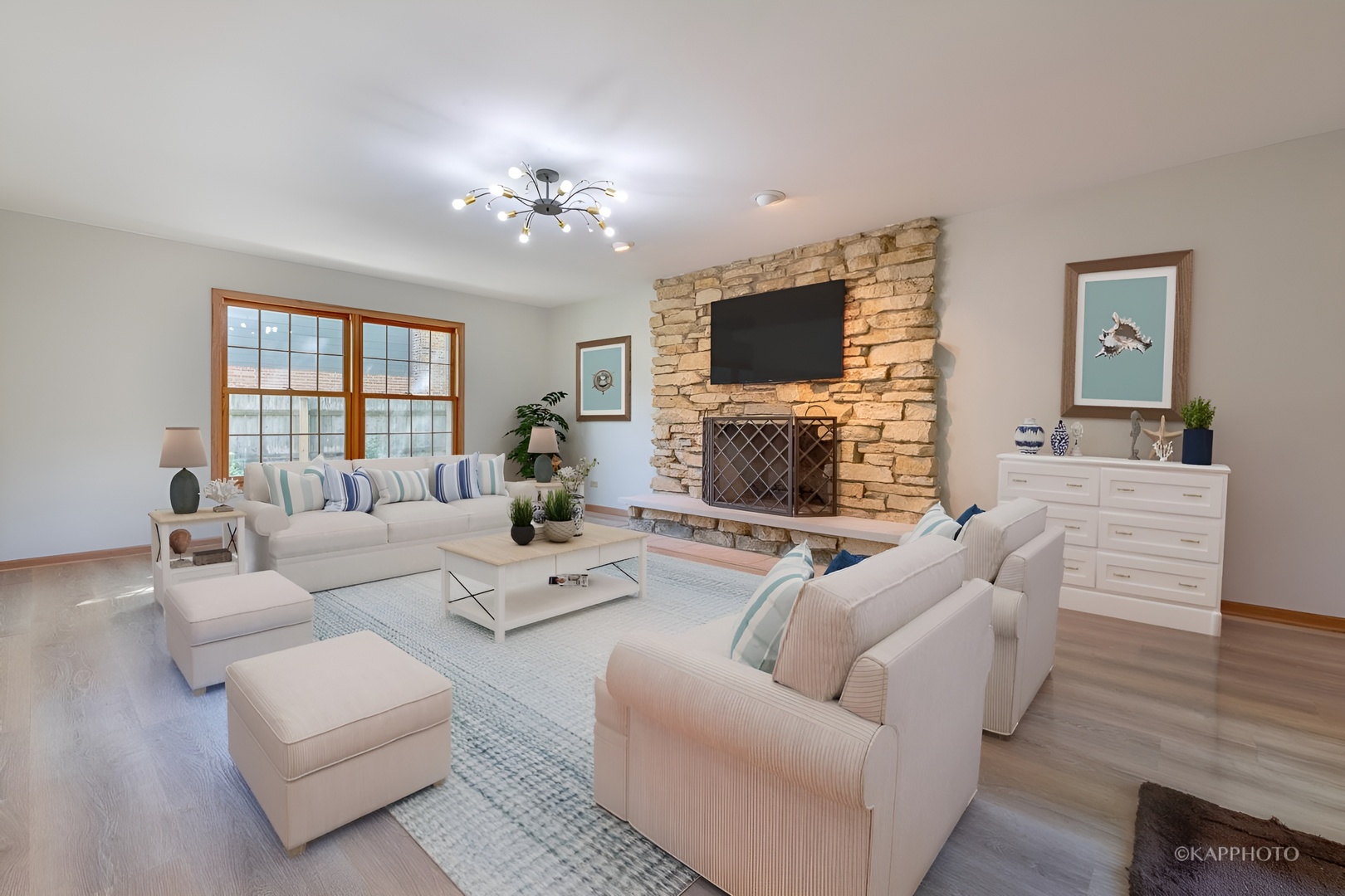 1553 Aztec Circle Naperville, IL 60563 - Photo 15 of 45 a living room with furniture a flat screen tv and a fireplace