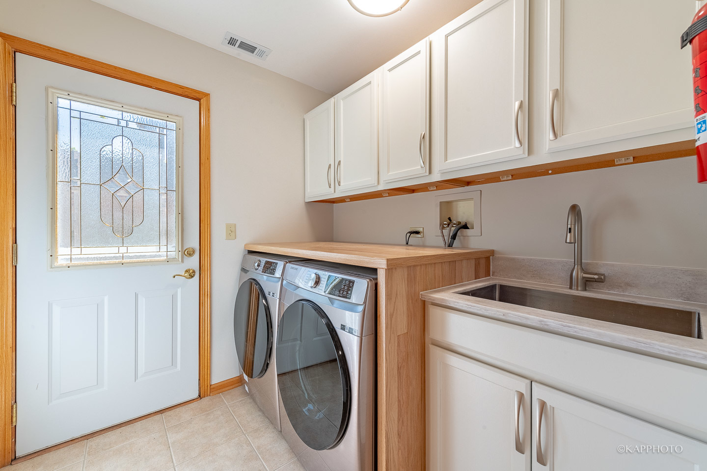 1553 Aztec Circle Naperville, IL 60563 - Photo 16 of 45 a utility room with dryer and washer