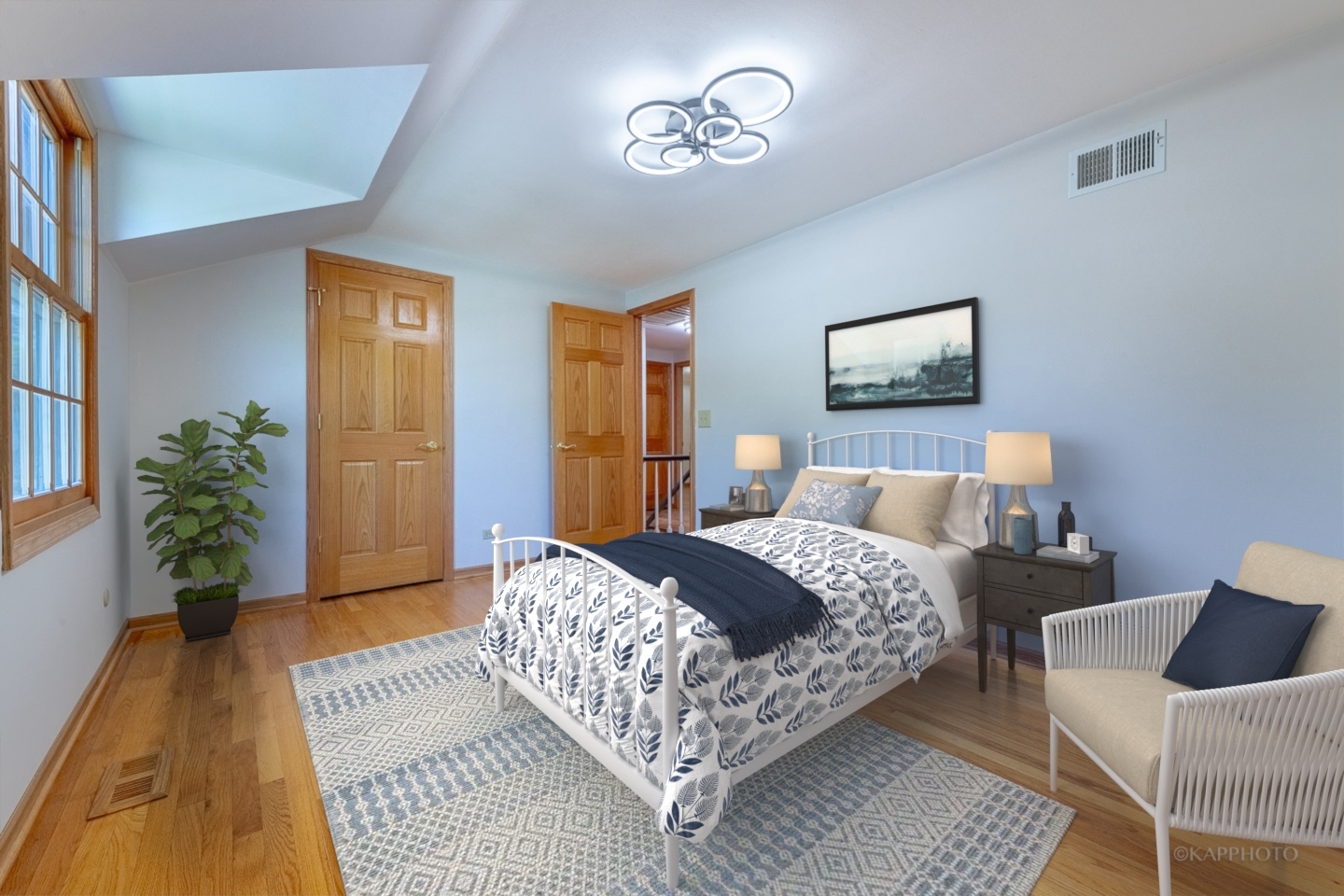 1553 Aztec Circle Naperville, IL 60563 - Photo 24 of 45 a bedroom with bed and a couch