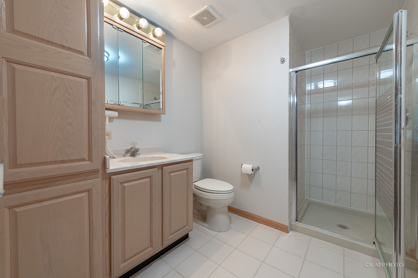 1553 Aztec Circle Naperville, IL 60563 - Photo 31 of 45 a bathroom with a toilet sink and shower