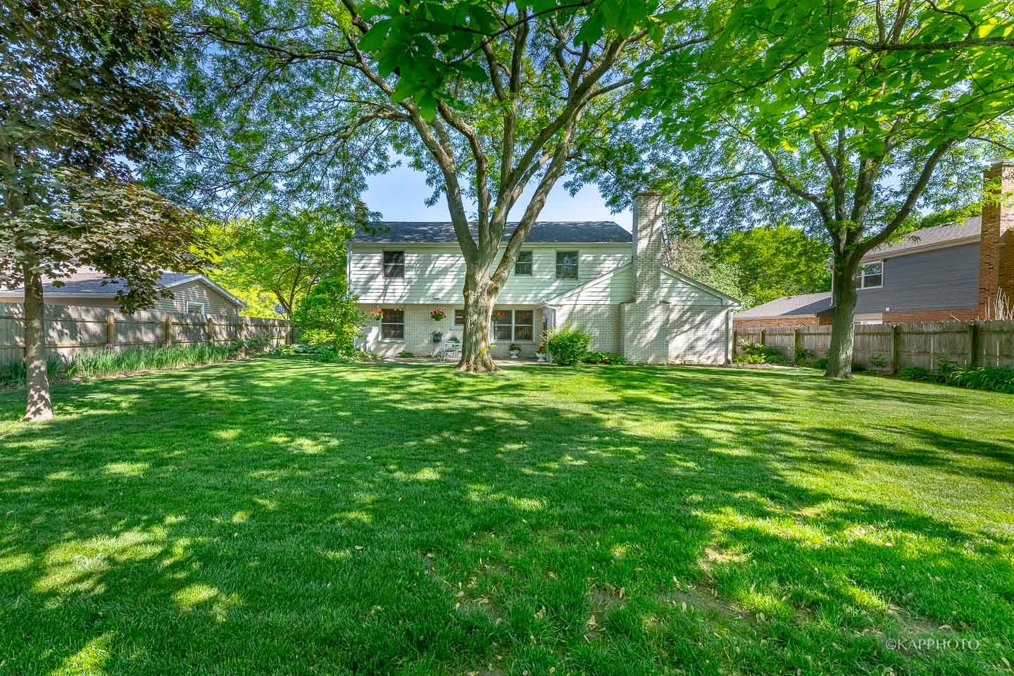 1553 Aztec Circle Naperville, IL 60563 - Photo 39 of 45 a view of a house with a yard