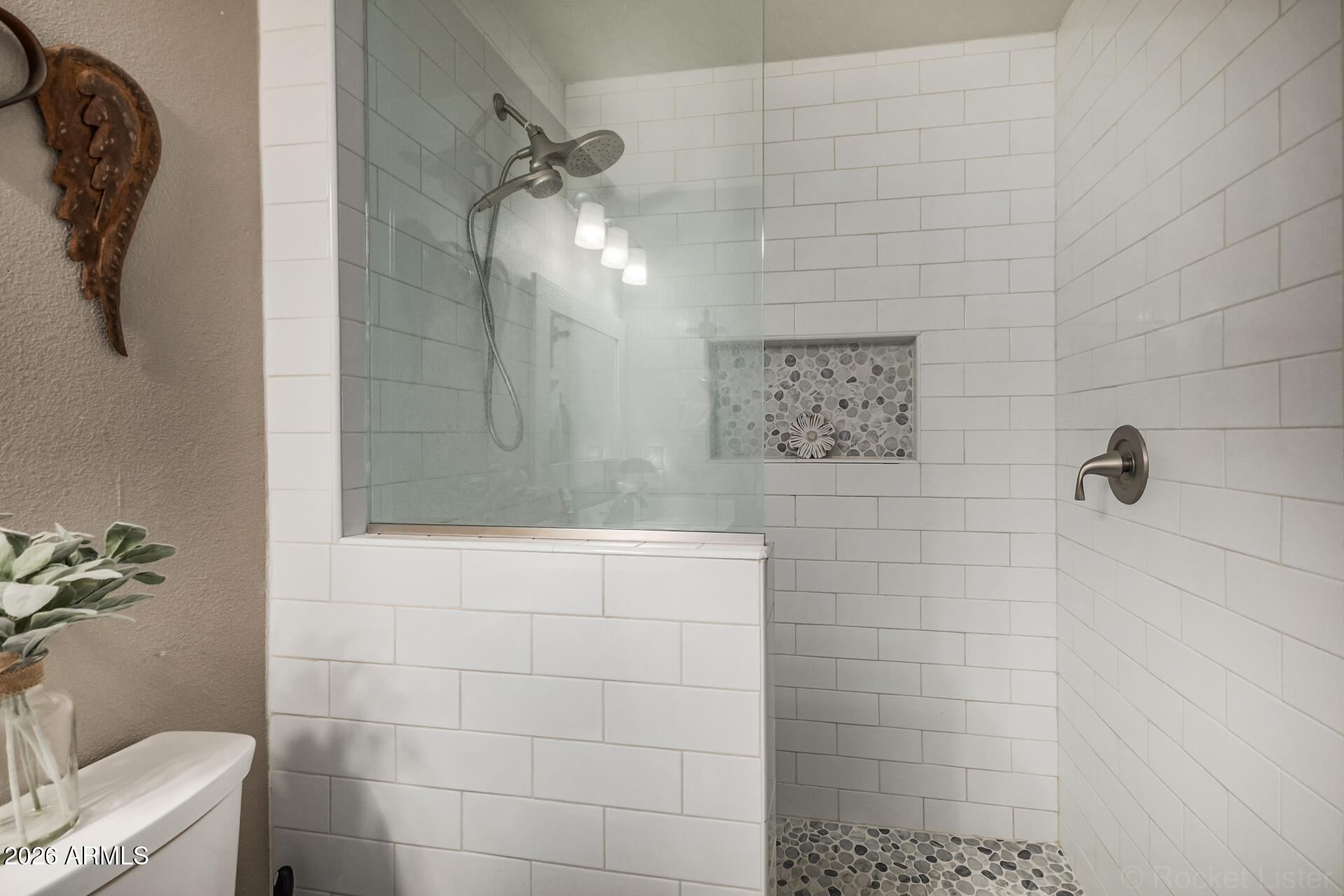 9845 West Royal Ridge Drive Sun City, AZ 85351 - Photo 24 of 28 a bathroom with a shower