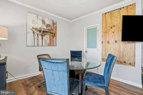 an aerial view of residential houses with outdoor space and river