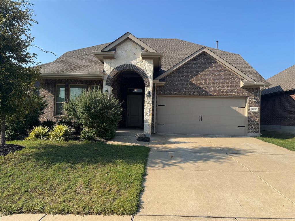 940 Azure Lane Celina, TX 75009 - Photo 1 of 26 a front view of a house with a yard