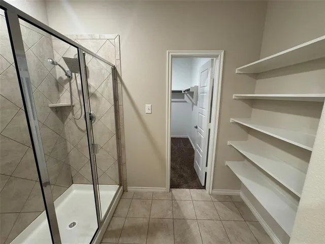 a view of an empty walk in closet