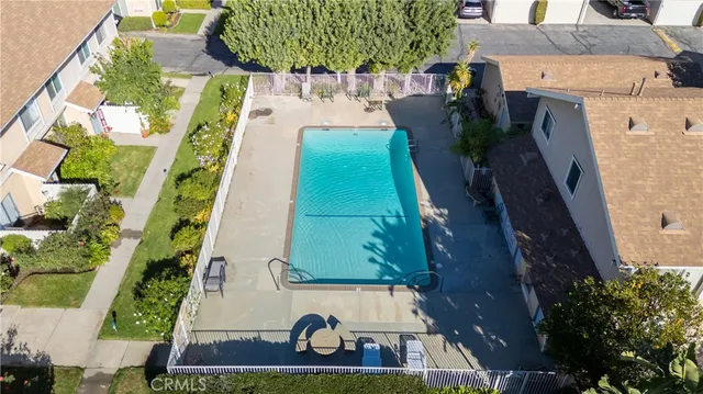 a view of swimming pool with outdoor seating