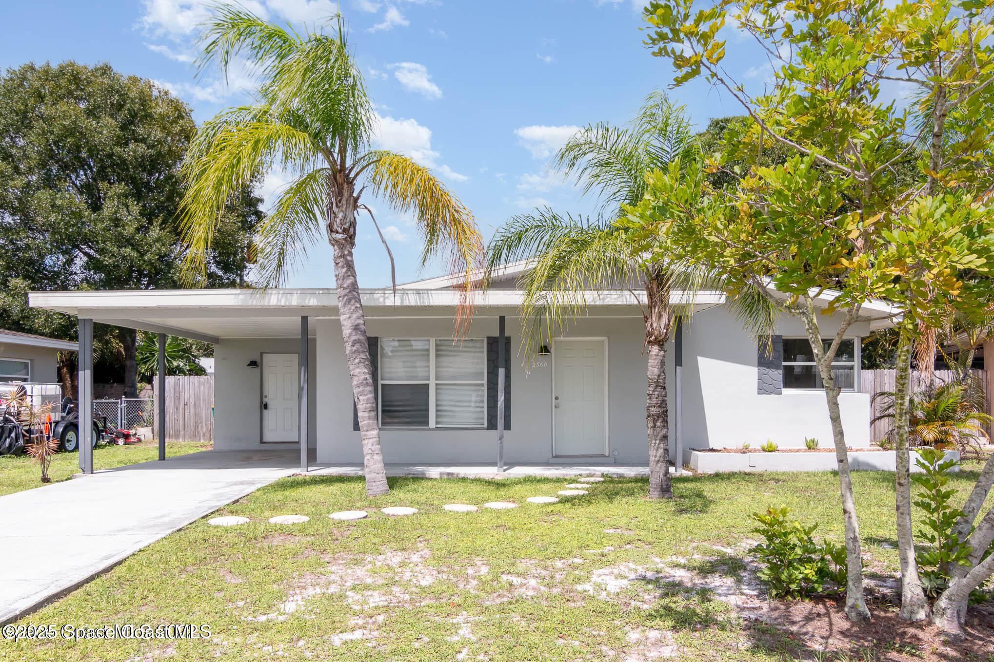 2360 Apache Drive Melbourne, FL 32935 - Photo 1 of 13 a view of a house with swimming pool