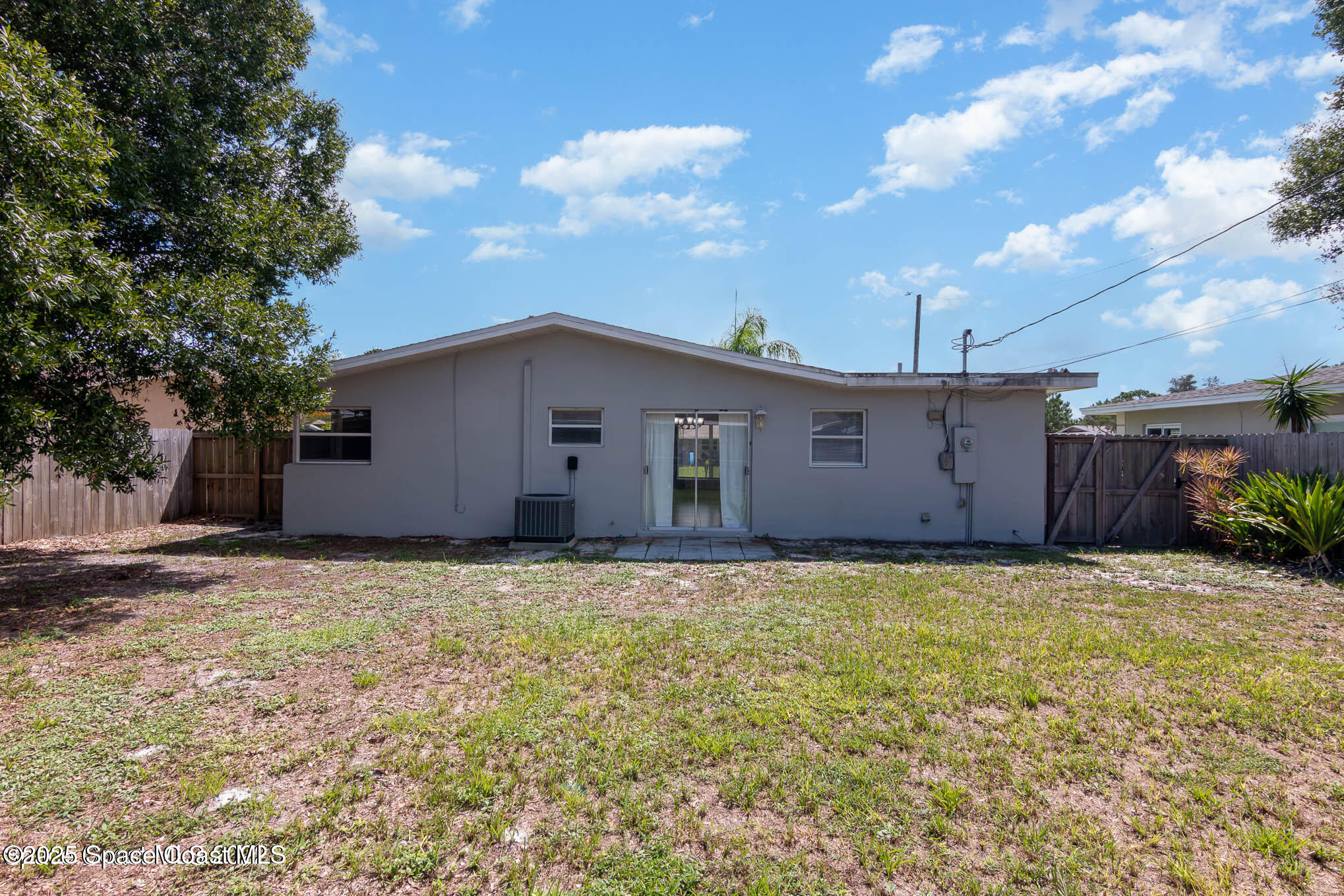 2360 Apache Drive Melbourne, FL 32935 - Photo 13 of 13 a view of a house with a backyard