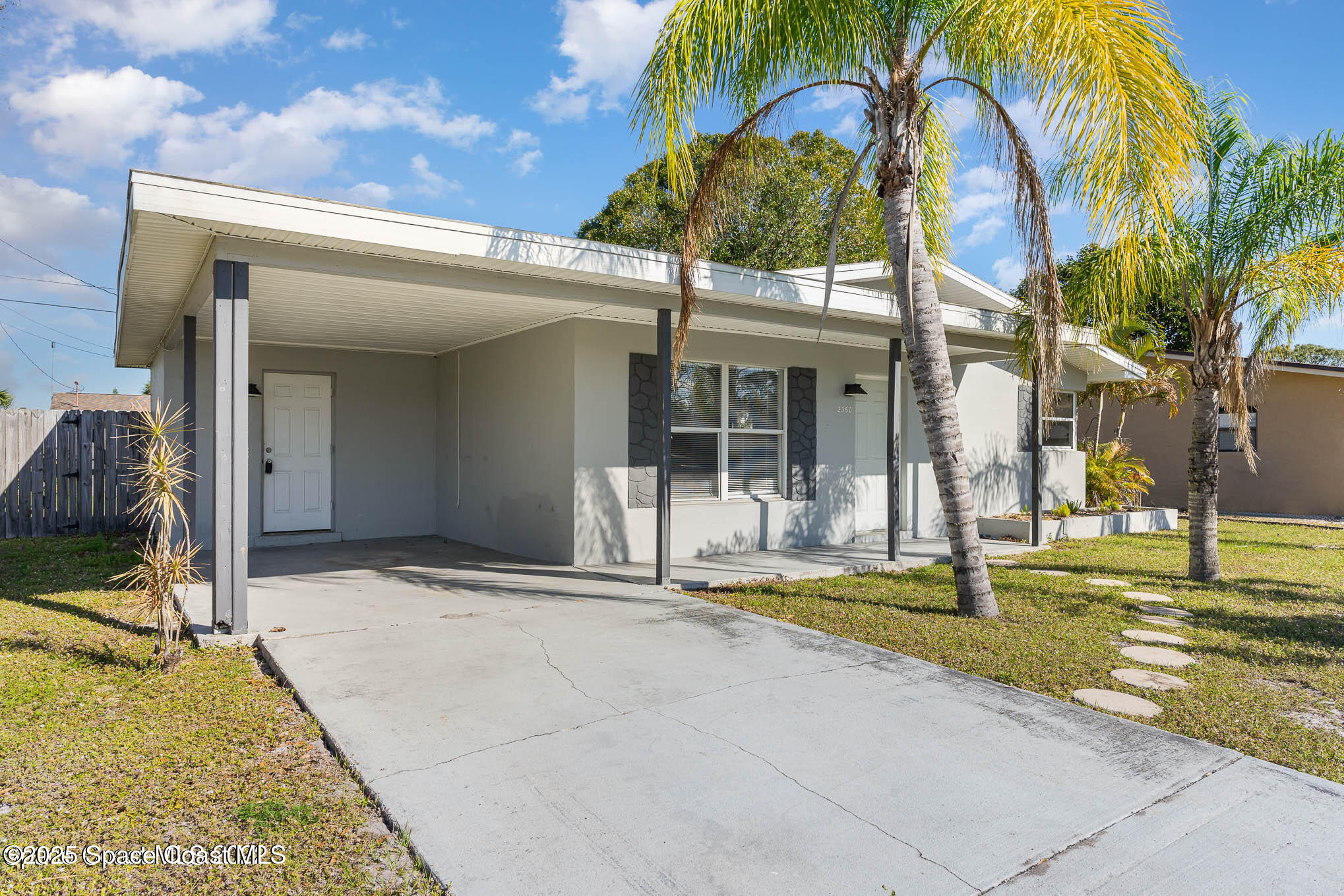 2360 Apache Drive Melbourne, FL 32935 - Photo 2 of 13 a view of a house with swimming pool and sitting area