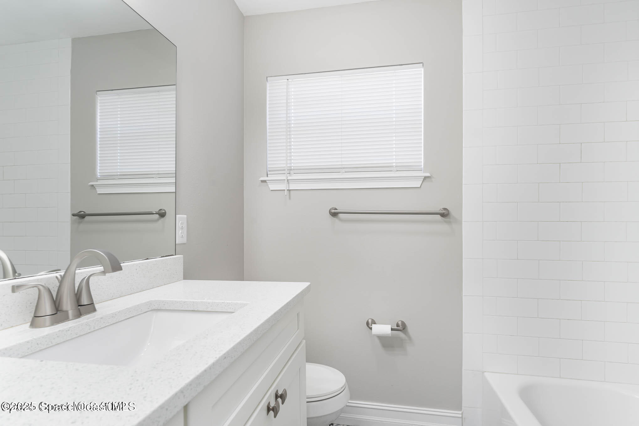 2360 Apache Drive Melbourne, FL 32935 - Photo 10 of 13 a bathroom with a granite countertop sink toilet and shower