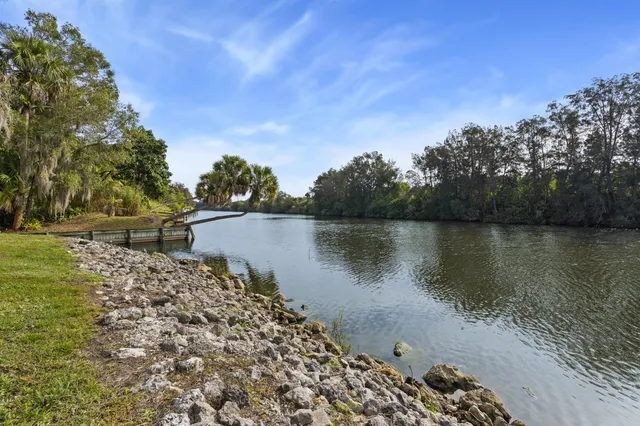 a view of a lake with a mountain in the background