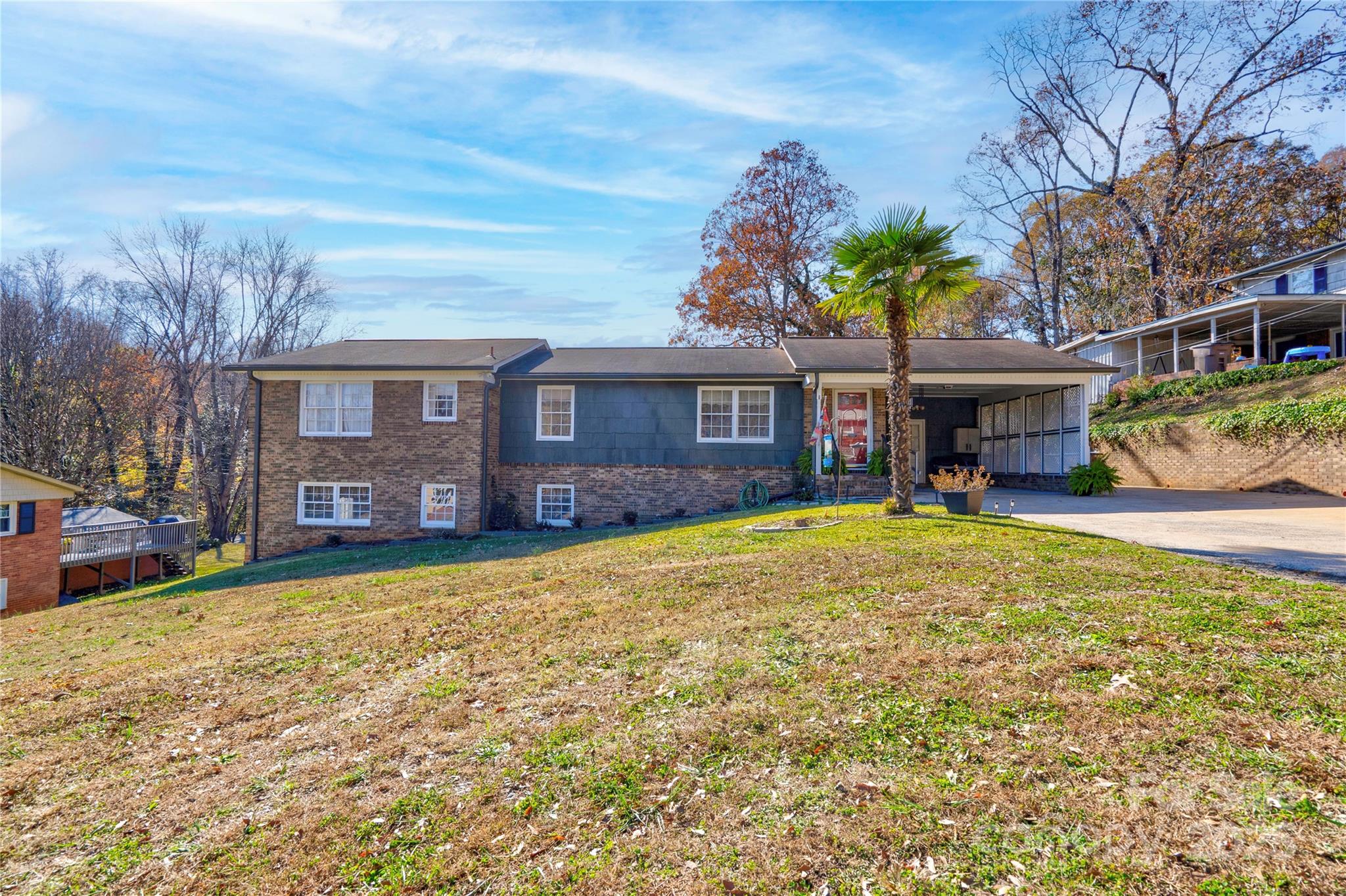a view of a house with a yard