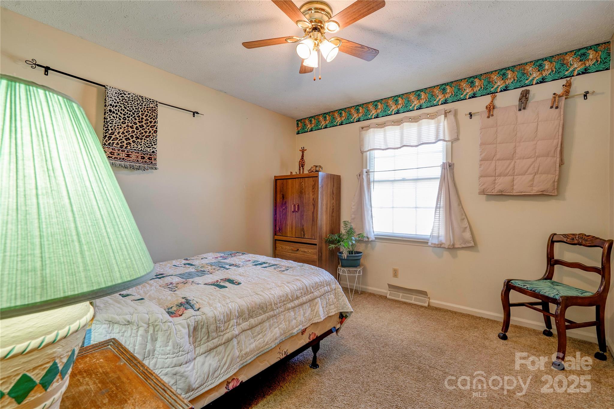 914 Parkwood Road Shelby, NC 28150 - Photo 15 of 40 a bedroom with a bed and a window