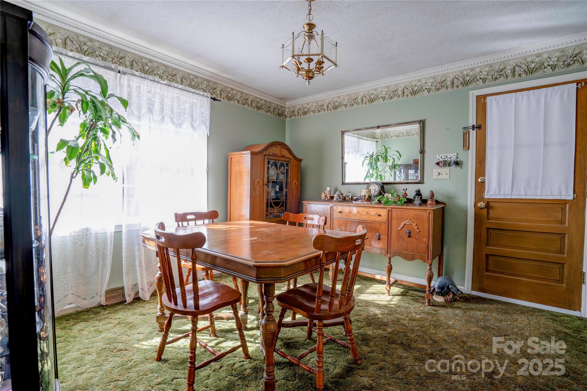 914 Parkwood Road Shelby, NC 28150 - Photo 6 of 40 a view of a dining room with furniture window and outside view