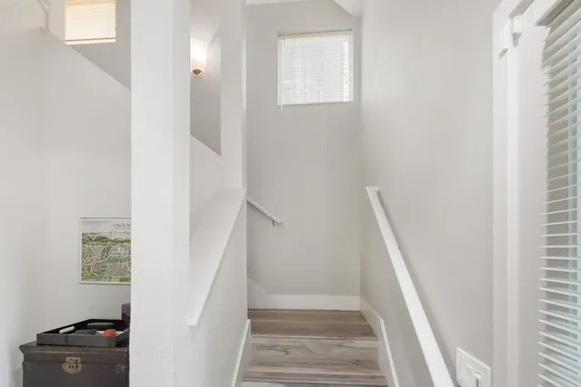 a living room with furniture windows and a fireplace