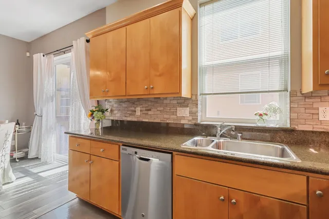 a view of a chair and table in the balcony
