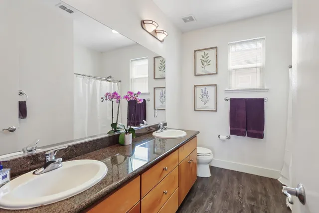 a reading room with furniture and a window