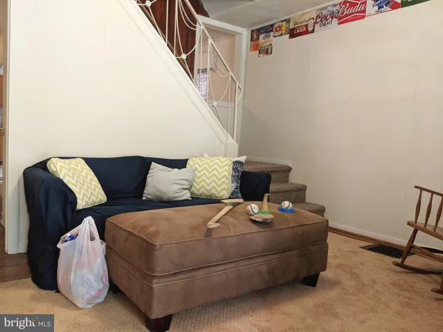 a living room with furniture and a couch